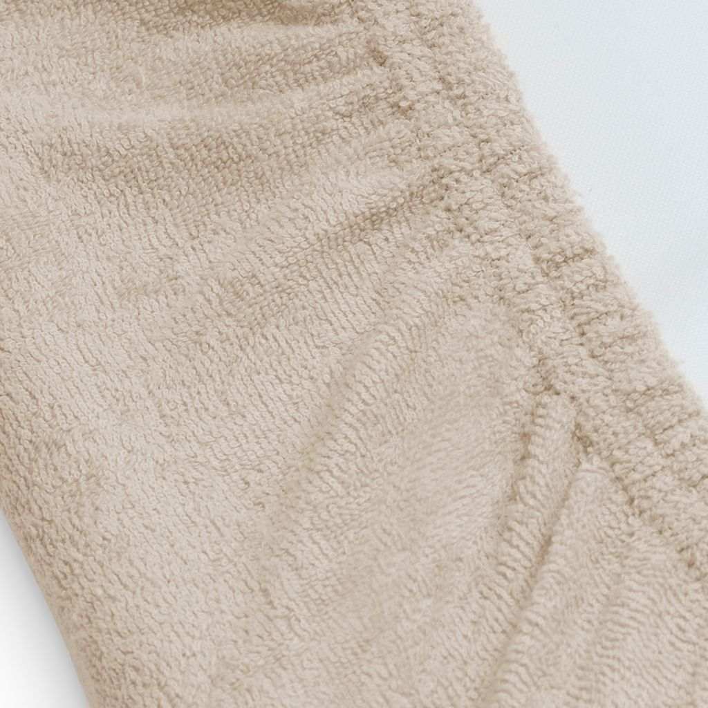 detail rand van elastiek badstof aankleedkussenhoes Jollein